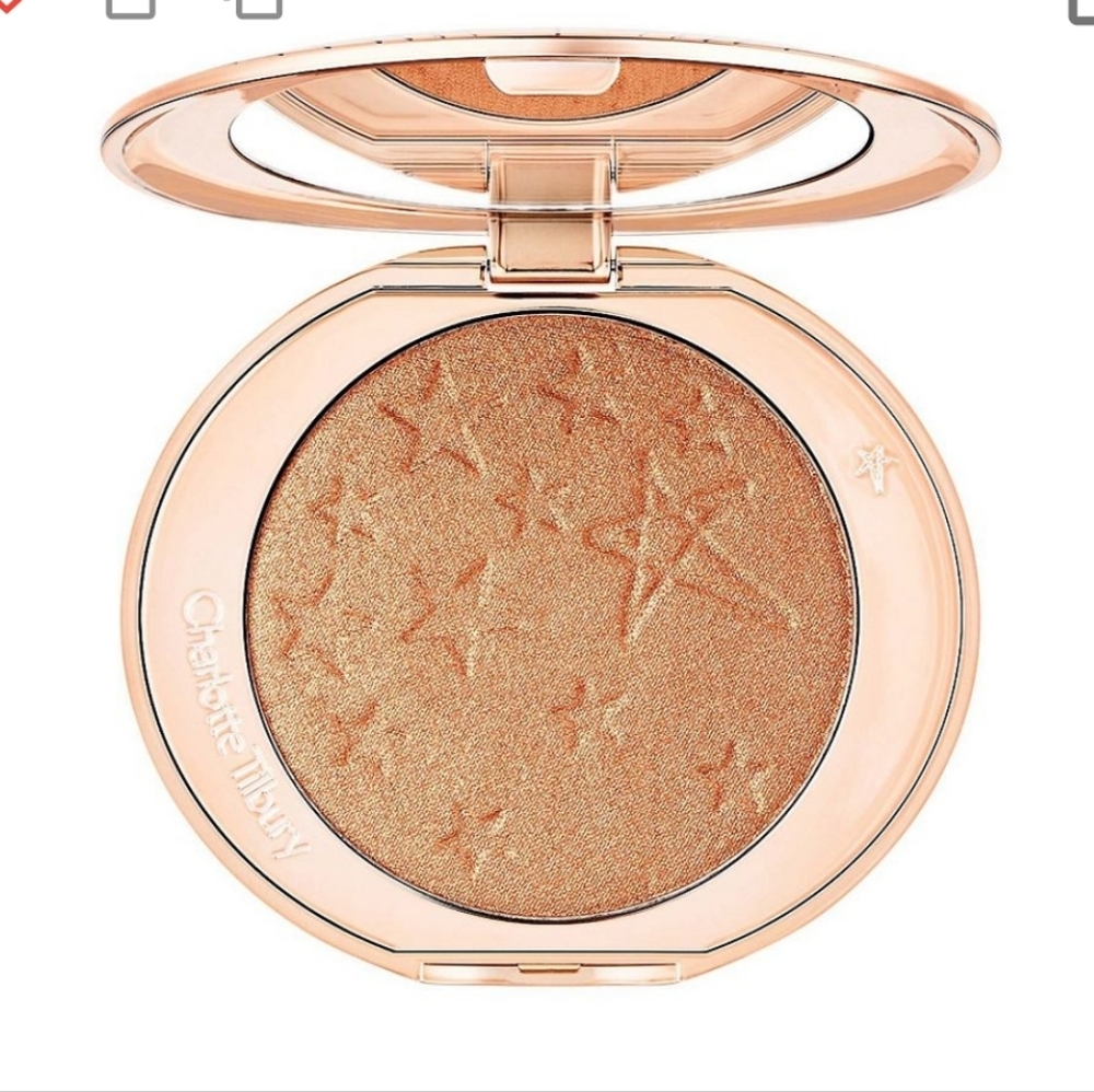 Charlotte Tilbury  Glow Glide Face Architect Highlighter In 'Rose Gold Glow'.